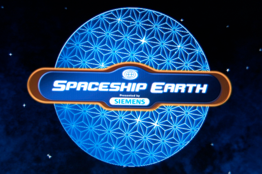 A picture from the Spaceship Earth descent sequence - a blue geodesic sphere pattern on a dark starfield
